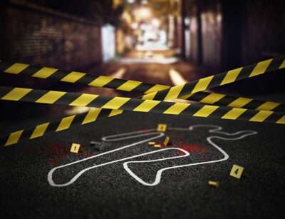 A staged crime scene outline with evidence markers and yellow caution tape in an alleyway.