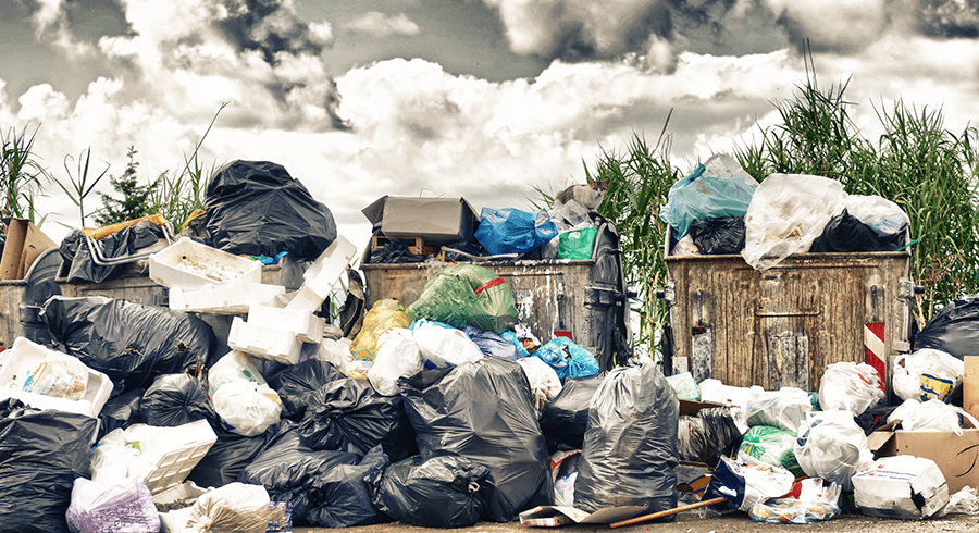 Trash troubles pile up with the county out of trash cans until